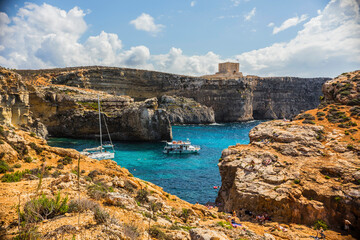 Fototapeta na wymiar Cliffs and sea view of Comino island, Malta. Seascape at Malta, Comino and Gozo islands