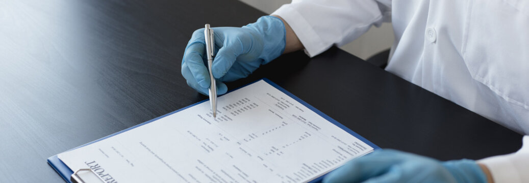 Scientists or physicians analyze the blood sample in vitro to prepare a vaccine against a new strain of viruses, Vaccine Research and Science concept.