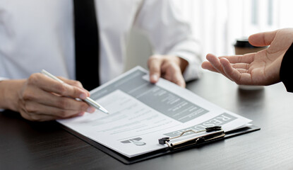 HR head is reading the resume and information about the candidate's history, Field employers are interviewing job applicants and negotiating agreements, Recruitment and job applications concept.