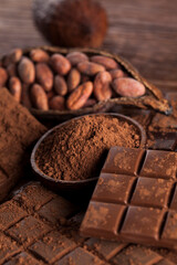 Dark and milk chocolate bar on a wooden table