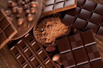 Chocolate bar, candy sweet, dessert food on wooden background