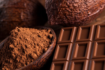 Chocolate bar, candy sweet, dessert food on wooden background