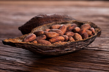 Cocoa pod on wooden background