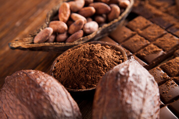 Chocolate bar, candy sweet, dessert food on wooden background