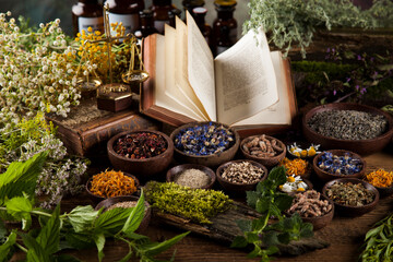 Herbal medicine on wooden desk background - obrazy, fototapety, plakaty