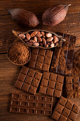 Bars Chocolate , candy sweet, dessert food on wooden background