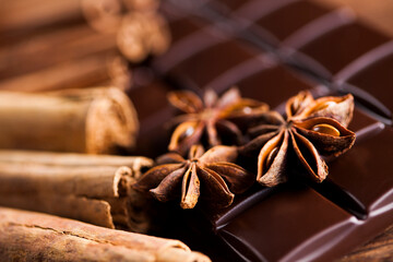 Obraz na płótnie Canvas Cinnamon and anise, Dark chocolate with candy sweet