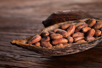 Cocoa pod on wooden background