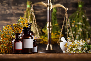 Herbal medicine on wooden desk background