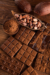 Chocolate bar, candy sweet, dessert food on wooden background