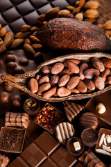 Dark and milk chocolate bar on a wooden table