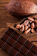 Chocolate bar, candy sweet, dessert food on wooden background