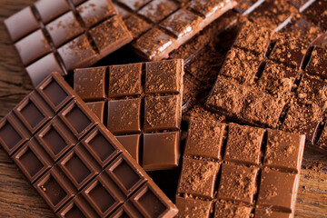 Bars Chocolate , candy sweet, dessert food on wooden background