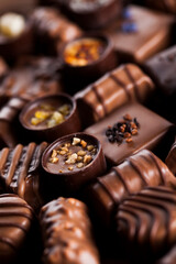 Praline Chocolate on wooden backgroud
