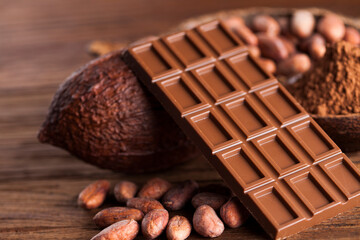 Cocoa pod and chocolate bar and food dessert background