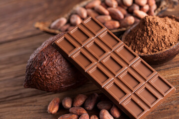 Cocoa pod and chocolate bar and food dessert background