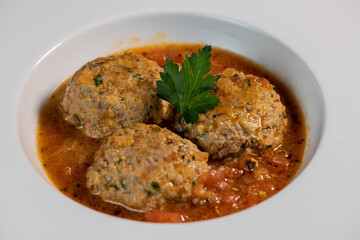 Recipe for meatballs in tomato sauce with hazelnut potatoes. High quality photo