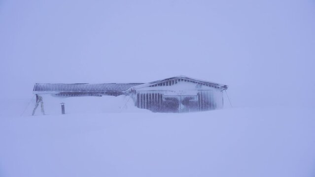 A mountain hut in a severe snow storm (whiteout) in Swedish Lapland during winter.