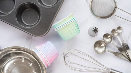 Top view of confectioner's table preparing to make cupcakes