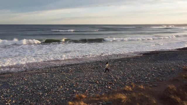 Woman Walking on Beach Aerial- Lawrencetown, Nova Scotia