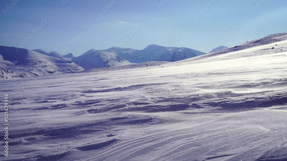 Fototapete Spindrift over the snow in the mountains of Swedish Lapland.