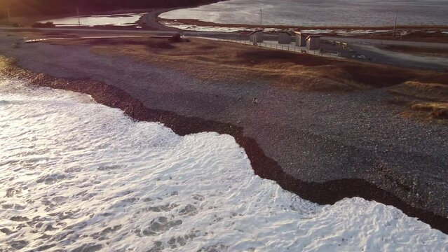 Woman Sitting on Beach Aerial- Lawrencetown, Nova Scotia
