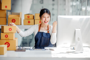 SME entrepreneur Small business entrepreneurs Online selling ideas,Happy Young Asian business owner...