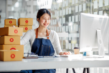 SME entrepreneur Small business entrepreneurs Online selling ideas,Happy Young Asian business owner...