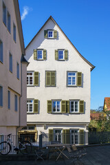 white house with shutters