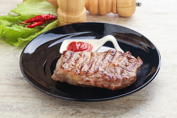 Grilled rib-eye steak beef meat