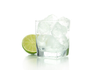 Glass with ice, and lime isolated on white background
