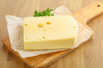 Maasdam cheese over the board