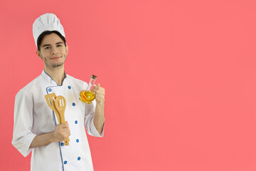 Concept of profession, young attractive male chef