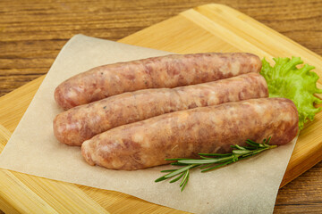 Raw pork meat sausages for grill