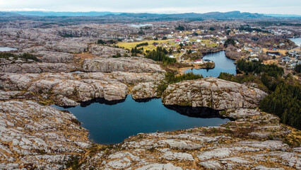 Aerial view of the cliffs of the coast of Norway, Telavog. Panoramic view of the rocks and the village. View of the rocks from the air.