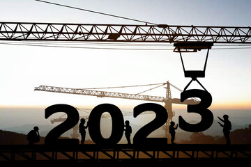Silhouette staff works as a to prepare to welcome the new year 2023
