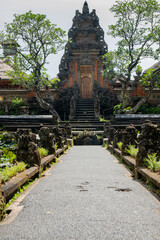 old bali temple surrounded by lotus pond Pura Taman Kemuda