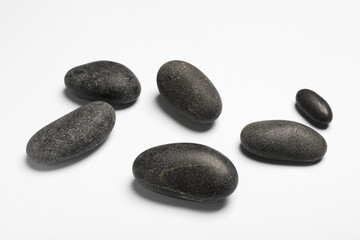 Group of different stones on white background