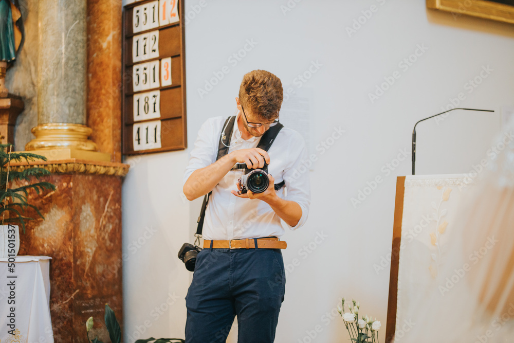 Sticker View of the fashion styled photograph taking photos on the background of a stand with numbers