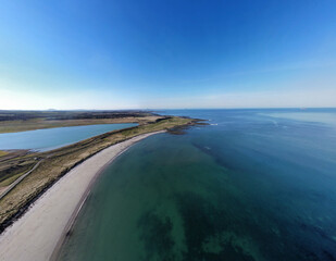 Aerial view of the incredible sea and beach on the east coast of Scotland