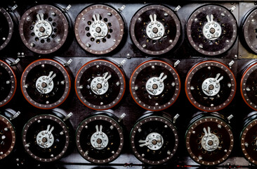 Closeup shot of indicator dials from the famous Bombe machine at Bletchley Park - obrazy, fototapety, plakaty