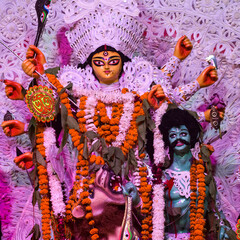 Goddess Durga with traditional look in close up view at a South Kolkata Durga Puja, Durga Puja...