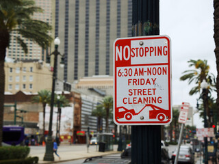 Closeup of the street sign with text. No stopping. Canal Street, New Orleans.