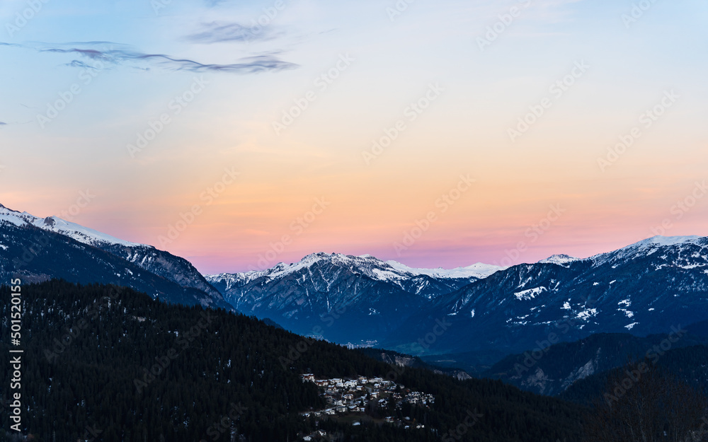 Wall mural Photo of snow-capped mountains in Falera, a municipality in the Surselva Region, Switzerland