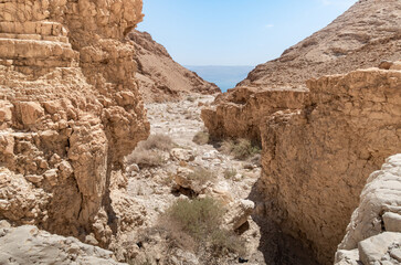 View  from a mountain near the Tamarim stream on the Israeli side of the Dead Sea and the mountains on the Jordan side near Jerusalem in Israel