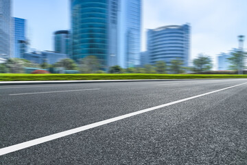 empty road with modern buildings on background, shanghai, china..
