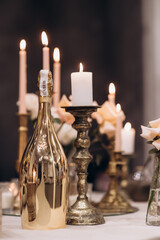 bohemian boho decor with candles on the wedding banquet table