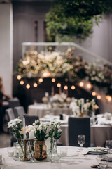 bohemian boho decor with candles on the wedding banquet table