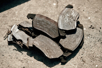 old used rusty car brake pads in bad condition