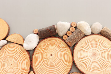Wooden logs over gray background, eco and spa concept
